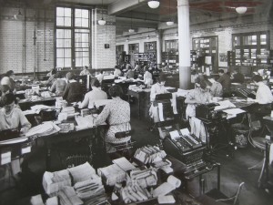 Blythe_House_preparing_totals_for_daily_balance_1930s